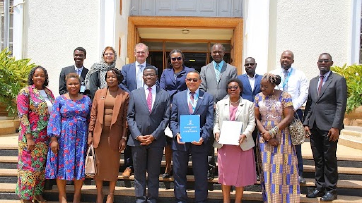 Katikkiro in a group photo with UNICEF officials and other Kingdom ministers Katikkiro in a group photo with UNICEF officials and other Kingdom ministers